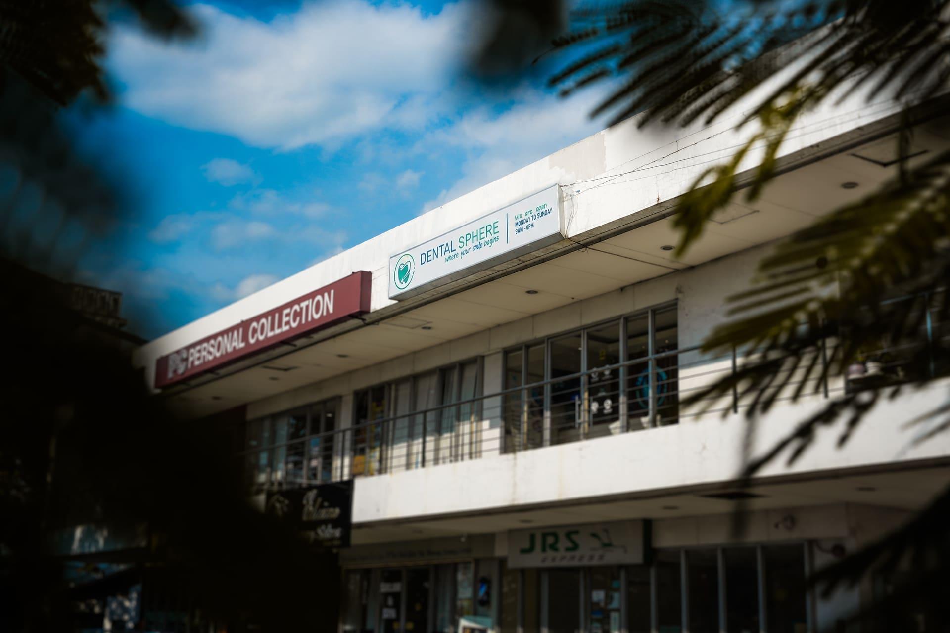Dental Sphere signage on the Eleve Town Center facade