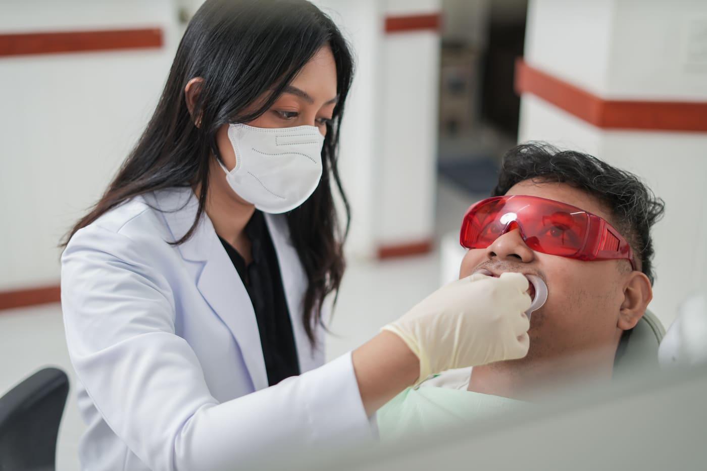 Teeth whitening procedure in progress